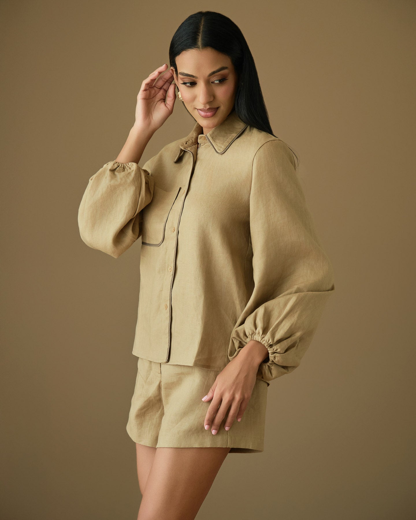 Tan linen co-ord set with long sleeve shirt and tailored shorts