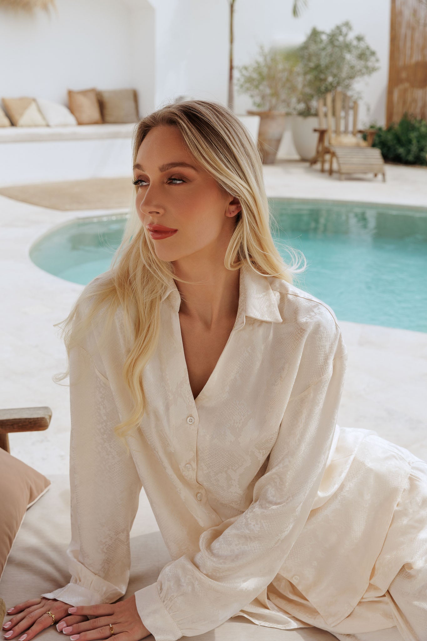 Cream relaxed fit shirt with wide-leg pants, understated and polished outfit