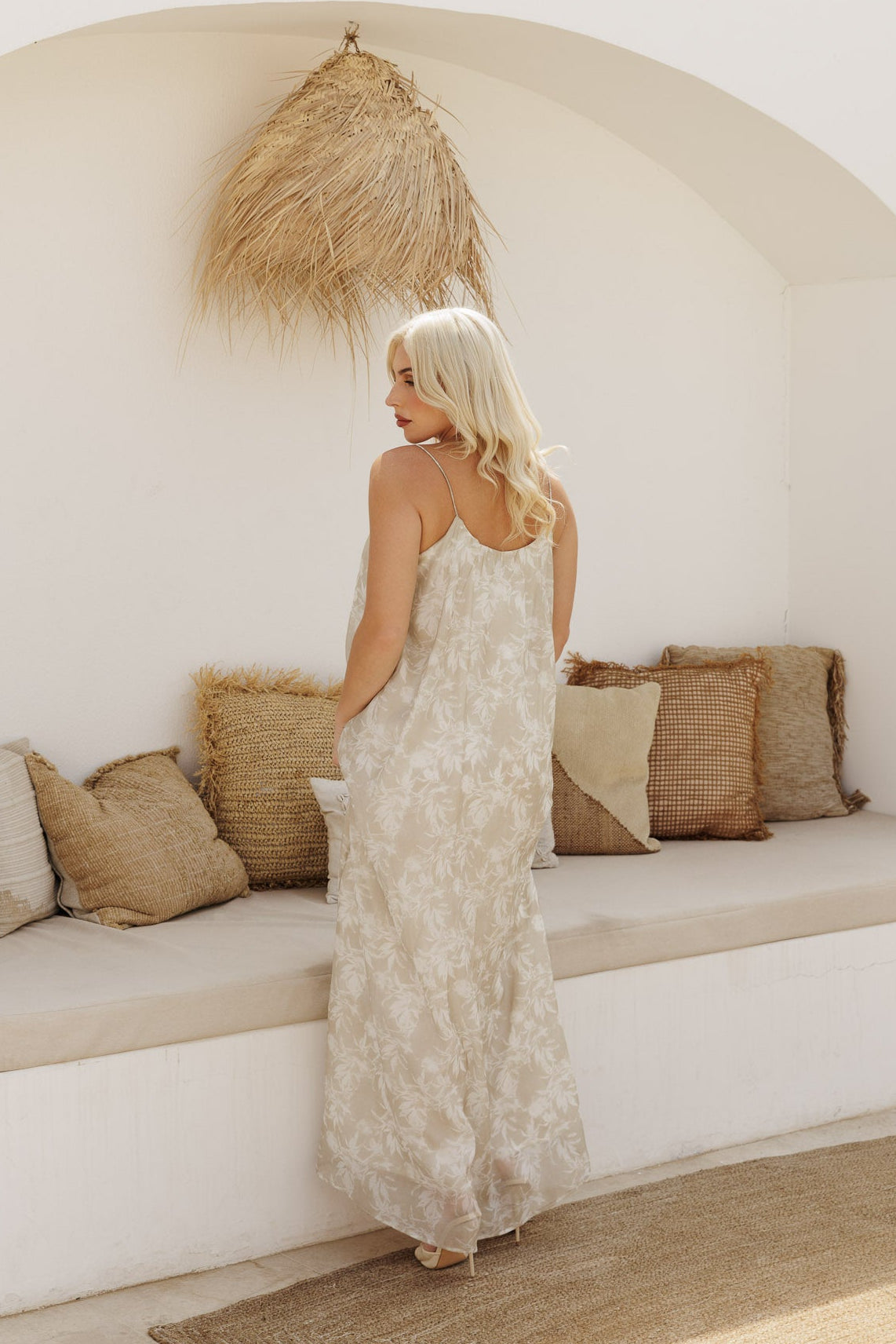 Effortless beige floral maxi dress with a soft, flowing silhouette made for sun-soaked days and summer nights