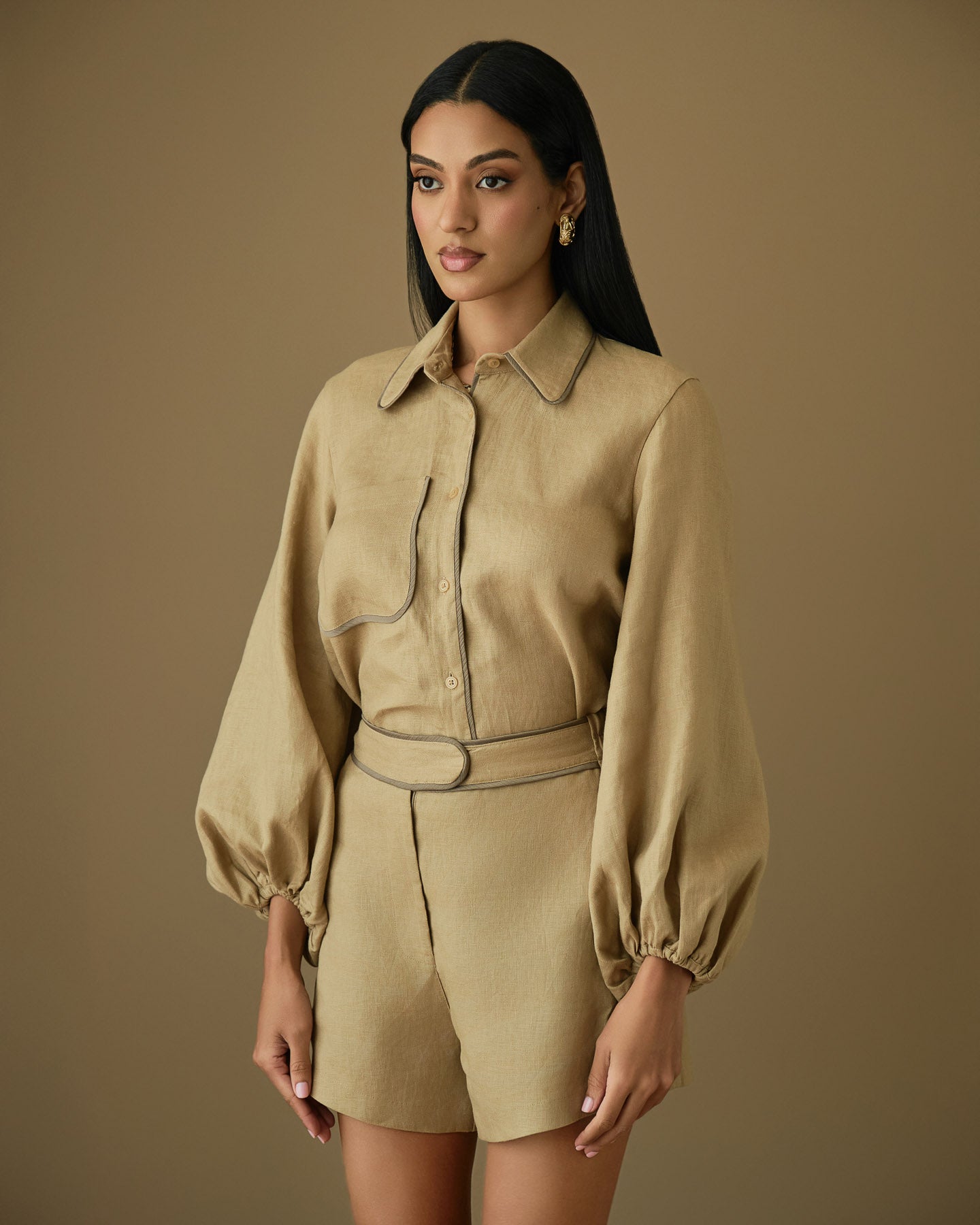 Tan linen shirt and shorts set for warm weather and resort wear