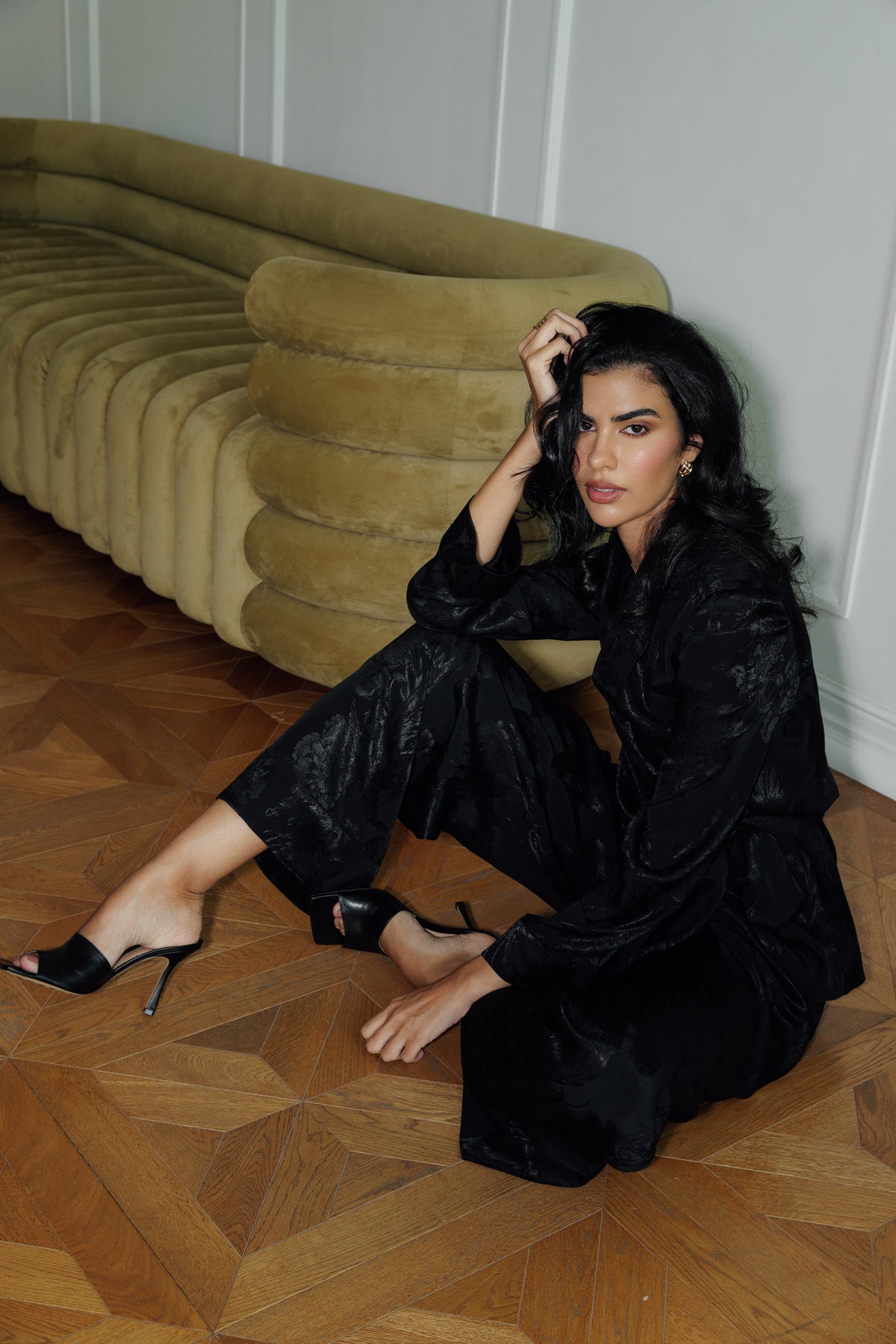 Model wearing the Lilah black blazer with matching wide-leg trousers