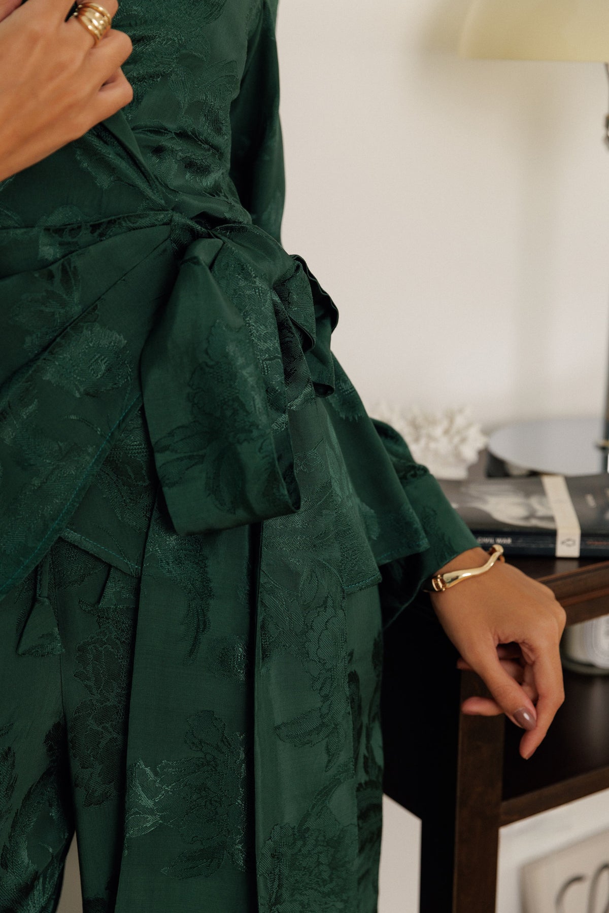 Lilah forest green pantsuit with a waist-tie blazer and wide-leg pants.