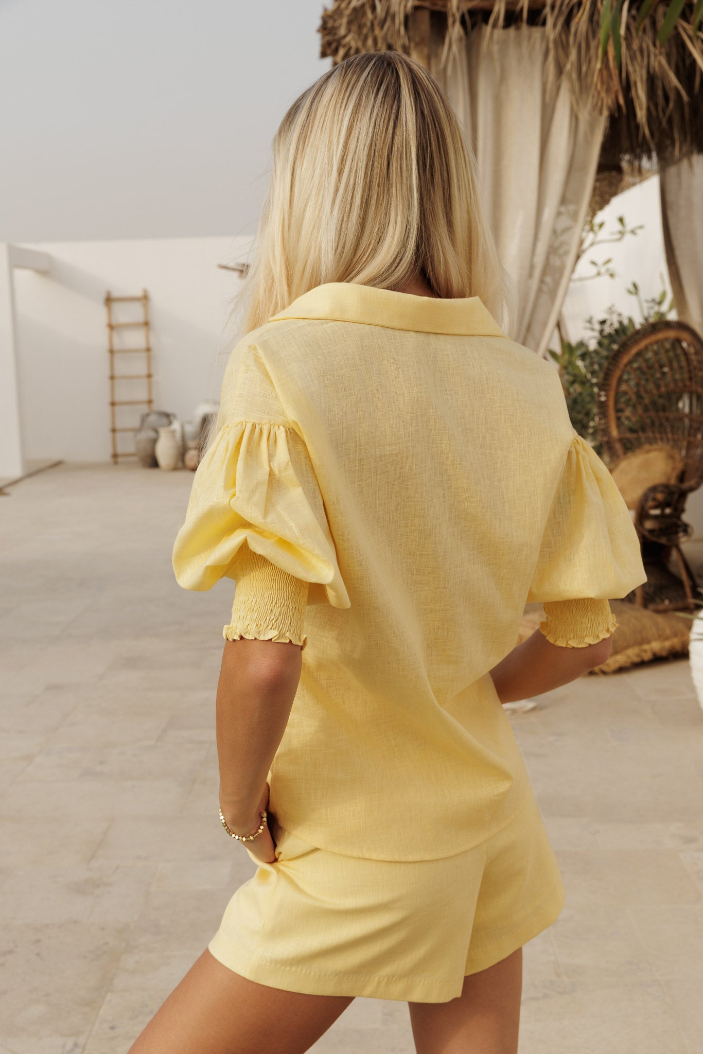 Light yellow blouse and shorts set with relaxed summer fit