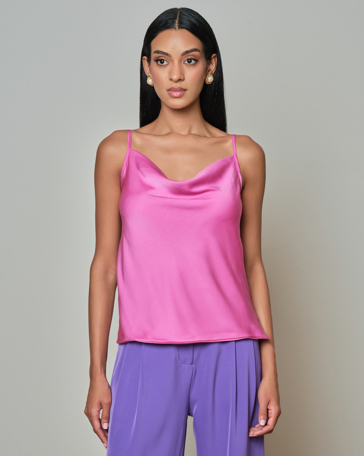 Fuchsia satin slip top with a fluid shape and minimal, clean finish
