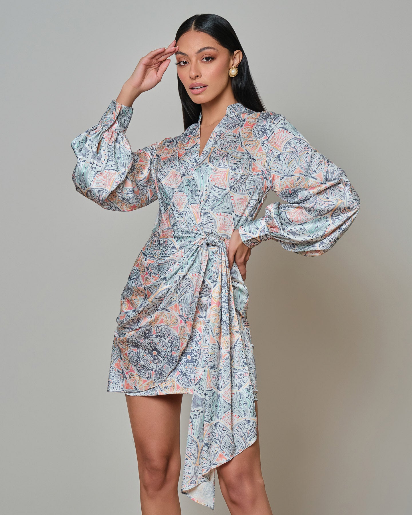 Floral satin mini dress with wrap front and elegant flow