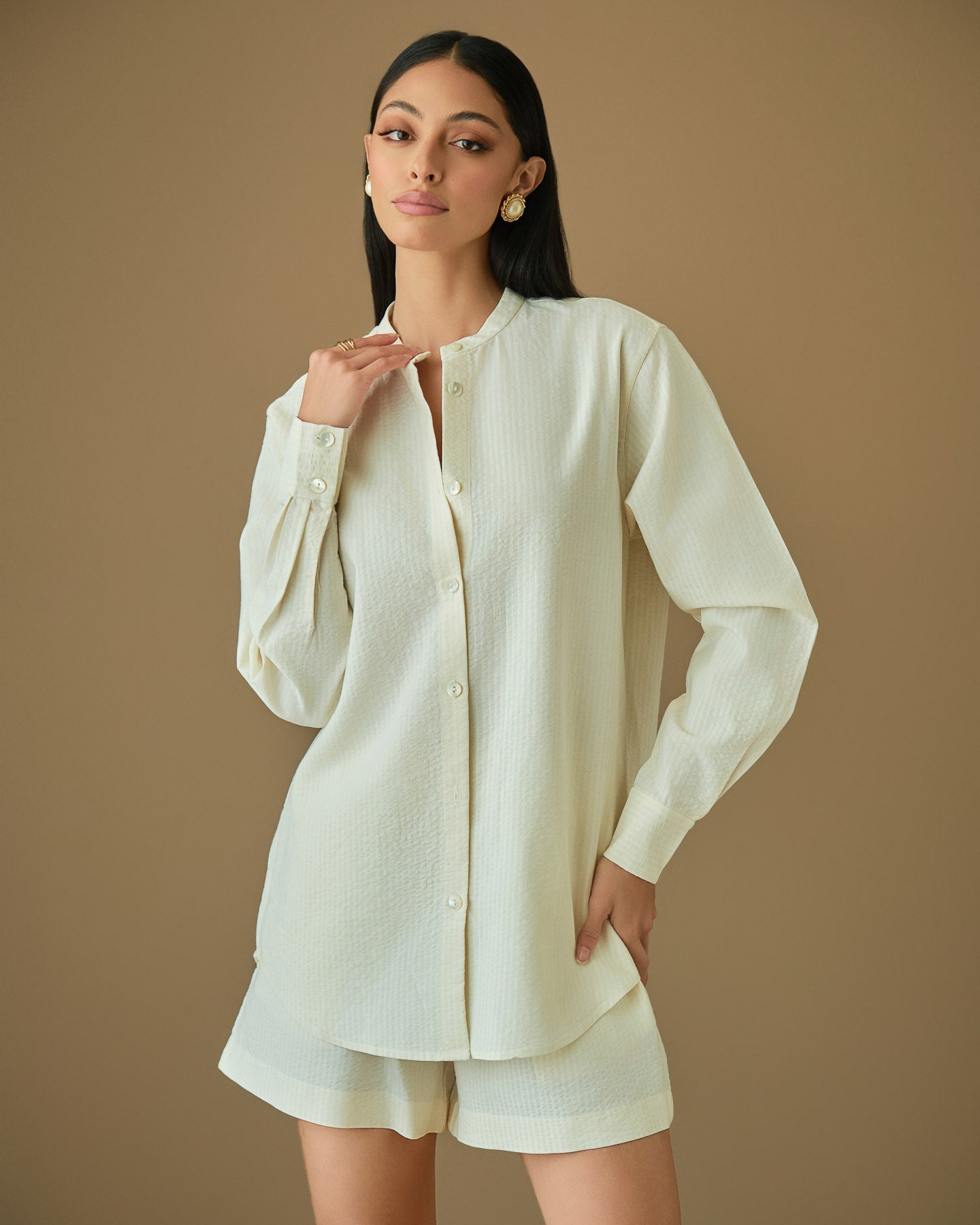 Cream cotton shirt and shorts set with relaxed fit and lightweight breathable fabric