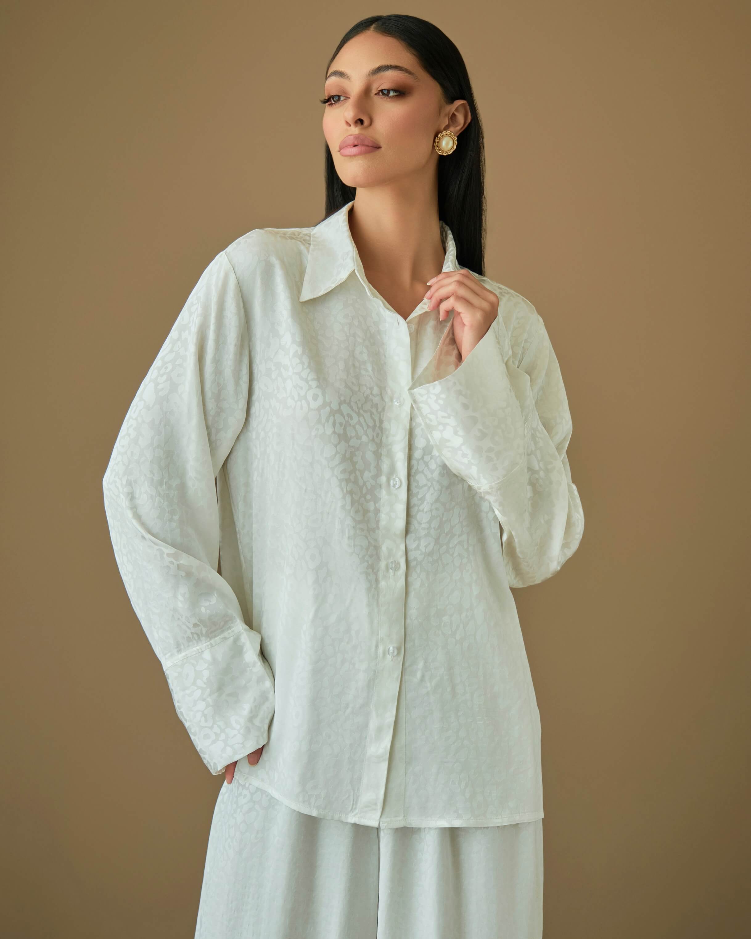 White two piece set with oversized shirt and flowy pants